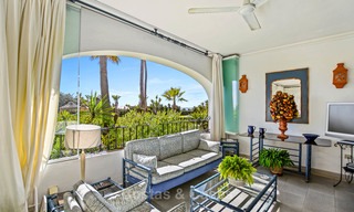 Charming, very spacious duplex ground floor apartment for sale, frontline beach and marina in Cabopino, East Marbella 10258 