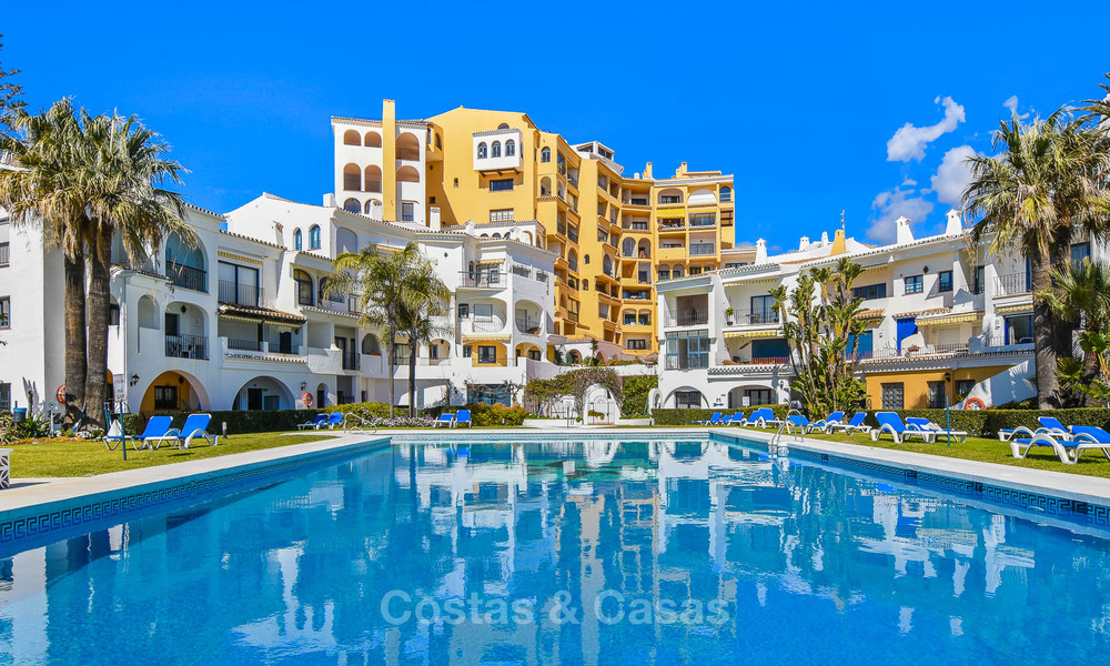 Charming, very spacious duplex ground floor apartment for sale, frontline beach and marina in Cabopino, East Marbella 10266