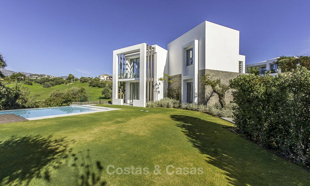 Eye-catching modern designer villa with stunning sea views for sale, frontline golf and ready to move in, East Marbella 11824