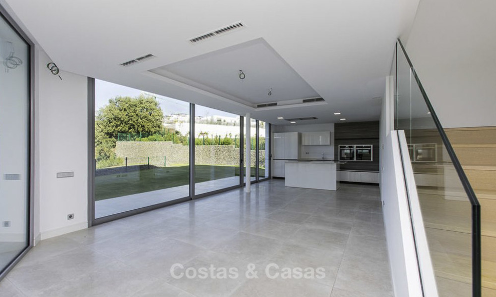 Eye-catching modern designer villa with stunning sea views for sale, frontline golf and ready to move in, East Marbella 11825