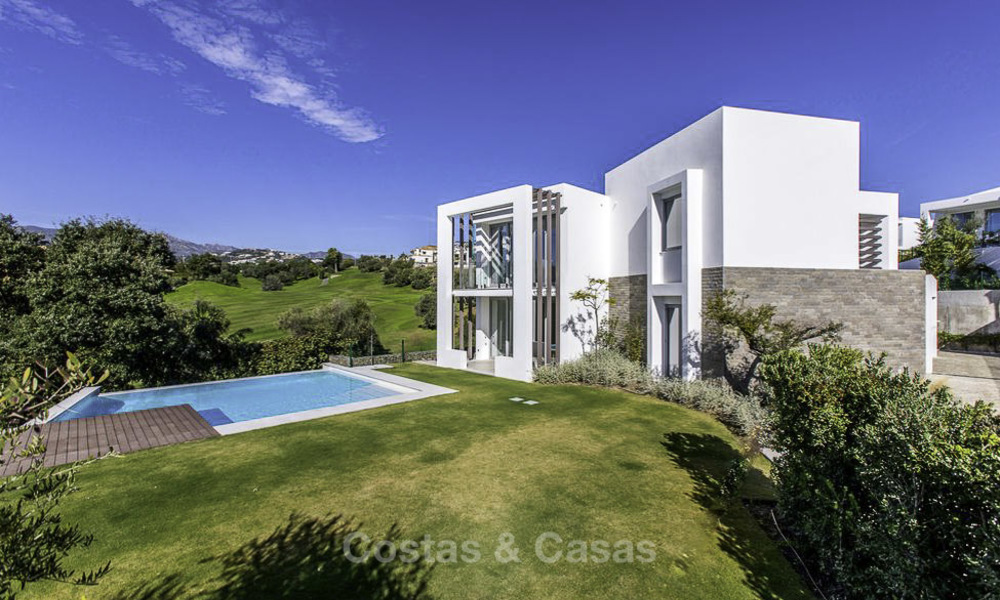 Eye-catching modern designer villa with stunning sea views for sale, frontline golf and ready to move in, East Marbella 11836