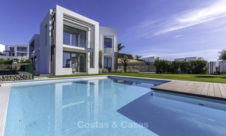 Eye-catching modern designer villa with stunning sea views for sale, frontline golf and ready to move in, East Marbella 11840 