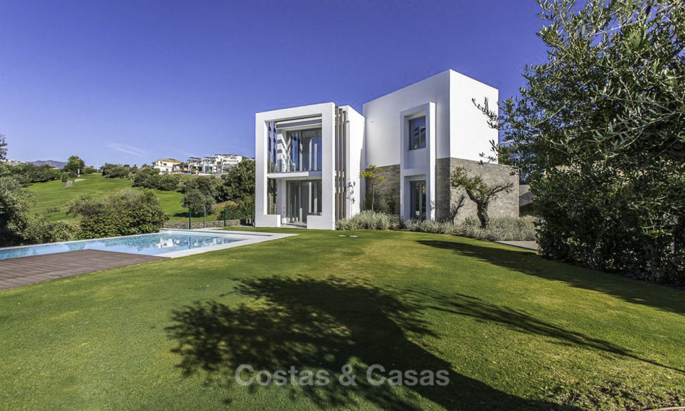 Eye-catching modern designer villa with stunning sea views for sale, frontline golf and ready to move in, East Marbella 11841