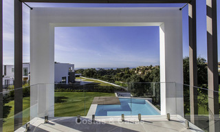 Eye-catching modern designer villa with stunning sea views for sale, frontline golf and ready to move in, East Marbella 11843 