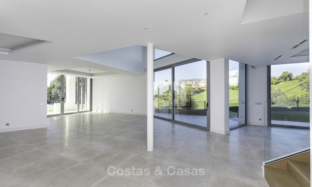 Eye-catching modern designer villa with stunning sea views for sale, frontline golf and ready to move in, East Marbella 11845