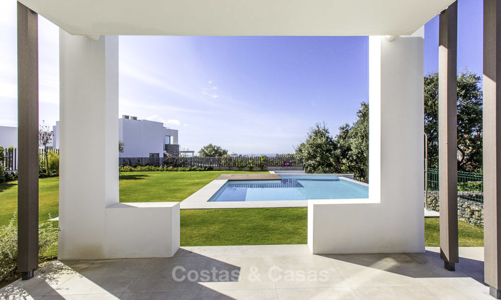 Eye-catching modern designer villa with stunning sea views for sale, frontline golf and ready to move in, East Marbella 11848
