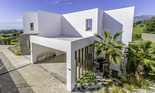 Eye-catching modern designer villa with stunning sea views for sale, frontline golf and ready to move in, East Marbella 11856 