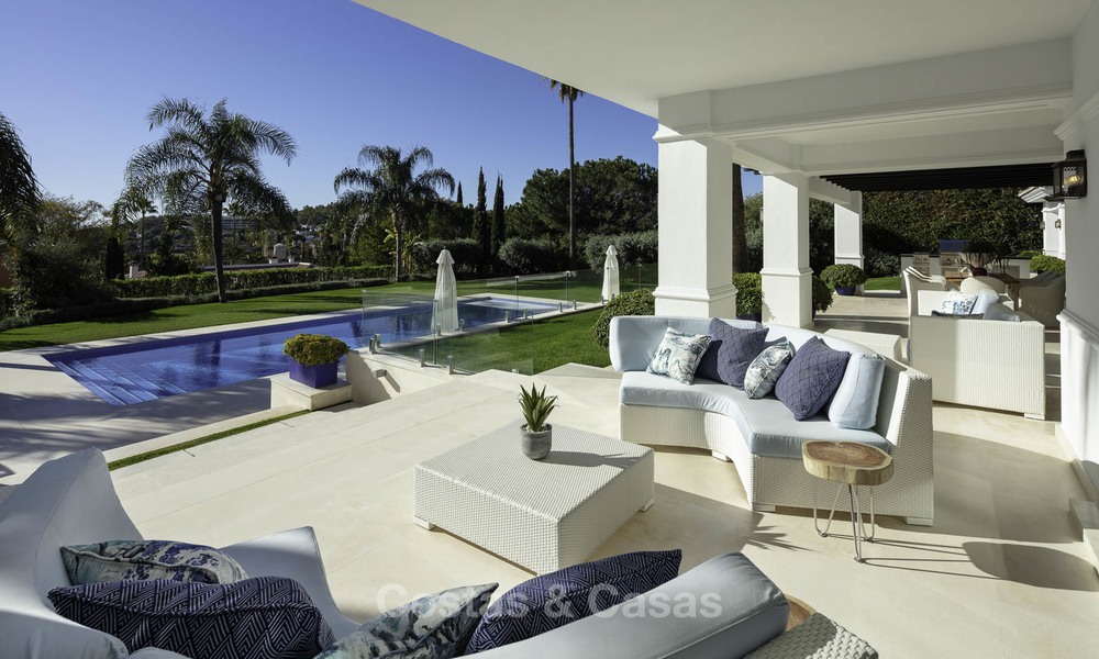 Outstanding modern luxury villa with amazing golf and sea views for sale in the heart of Nueva Andalucía, Marbella 12073