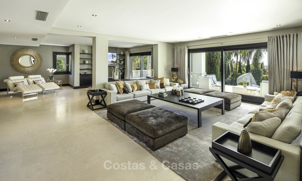 Outstanding modern luxury villa with amazing golf and sea views for sale in the heart of Nueva Andalucía, Marbella 12076