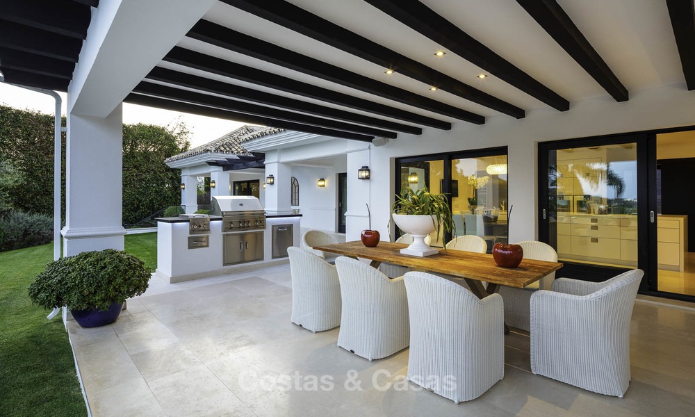 Outstanding modern luxury villa with amazing golf and sea views for sale in the heart of Nueva Andalucía, Marbella 12098