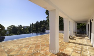 Charming traditional style villa with sea and mountain views for sale in El Madroñal, Benahavis, Marbella 12632 