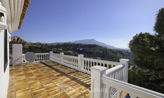 Charming traditional style villa with sea and mountain views for sale in El Madroñal, Benahavis, Marbella 12640 