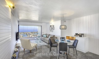 Fully renovated modern luxury apartment for sale in the marina of Puerto Banus with panoramic views over the port and the sea, Marbella. Bottom price! 12747 