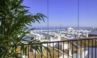 Fully renovated modern luxury apartment for sale in the marina of Puerto Banus with panoramic views over the port and the sea, Marbella. Bottom price! 12749 
