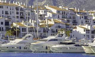 Fully renovated modern luxury apartment for sale in the marina of Puerto Banus with panoramic views over the port and the sea, Marbella. Bottom price! 12754 