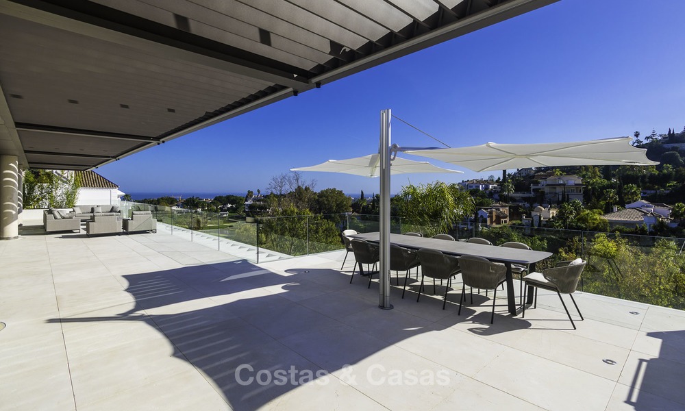 Brand new modern luxury villa with golf and sea views for sale, ready to move into, in a posh golf resort in Nueva Andalucia, Marbella - Benahavis 13258