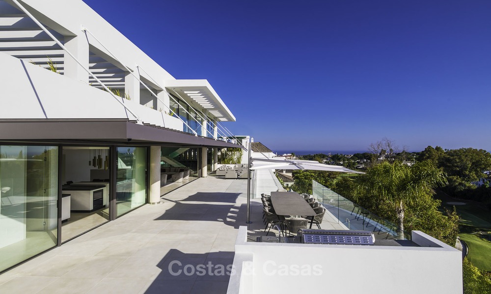 Brand new modern luxury villa with golf and sea views for sale, ready to move into, in a posh golf resort in Nueva Andalucia, Marbella - Benahavis 13270