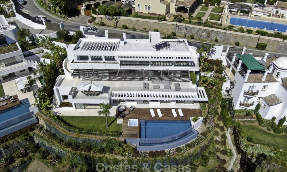 Brand new modern luxury villa with golf and sea views for sale, ready to move into, in a posh golf resort in Nueva Andalucia, Marbella - Benahavis 13310