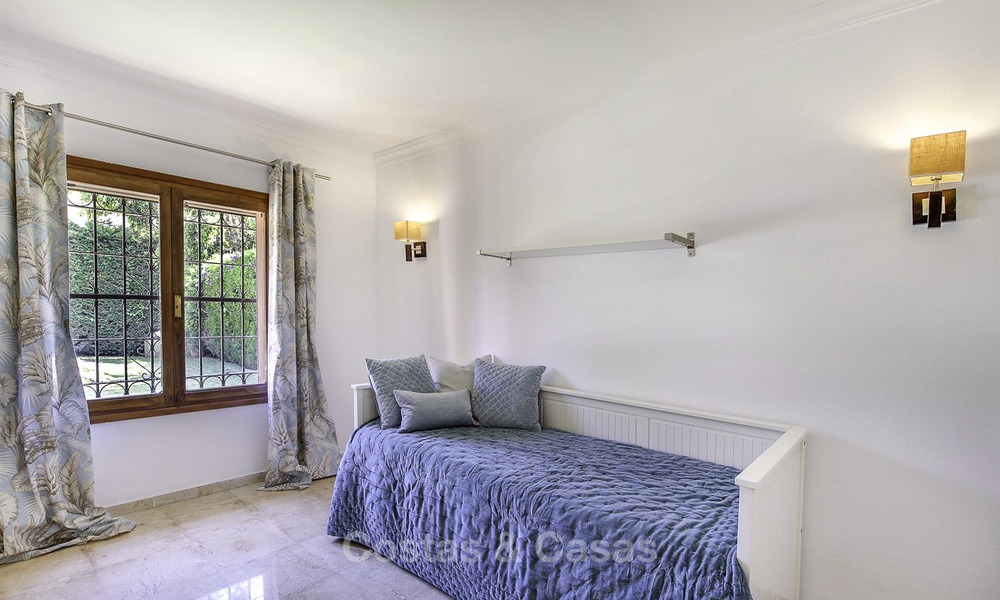 Cosy Mediterranean style villa for sale, walking distance to the beach, in a prestigious urbanisation, between Estepona and Marbella 14433
