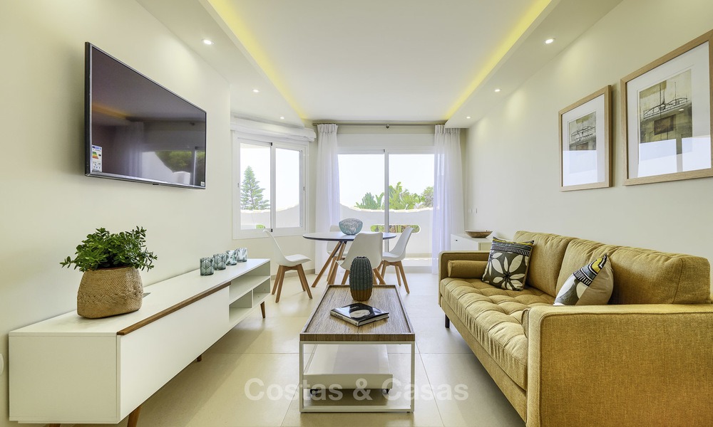 Fully renovated beachfront apartment with panoramic sea views for sale, Mijas Costa 14656