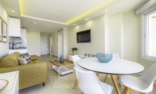 Fully renovated beachfront apartment with panoramic sea views for sale, Mijas Costa 14658 