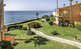 Spacious, fully renovated beachfront townhouse for sale in Estepona. Direct access to the beach and the beach promenade via the communal gardens. 15162 