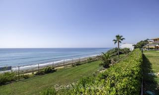 Spacious, fully renovated beachfront townhouse for sale in Estepona. Direct access to the beach and the beach promenade via the communal gardens. 15169 