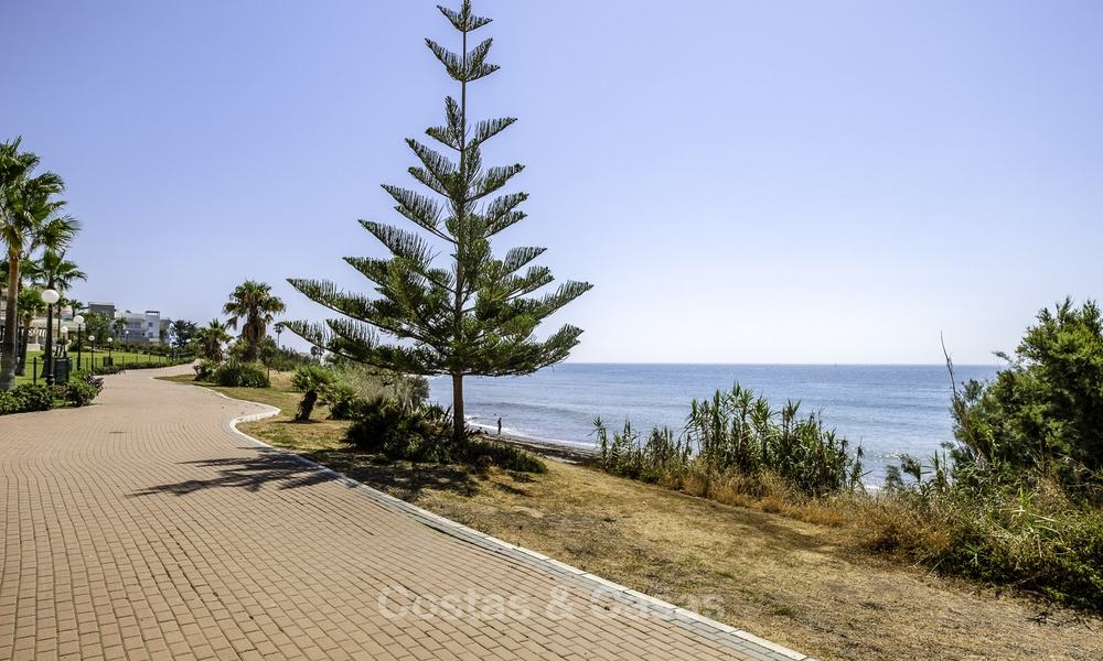 Spacious, fully renovated beachfront townhouse for sale in Estepona. Direct access to the beach and the beach promenade via the communal gardens. 15174