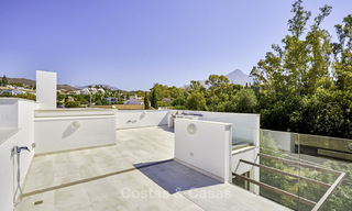 Move-in ready. Elegant and luxurious new contemporary townhouses for sale in Nueva Andalucia, Marbella 16797 