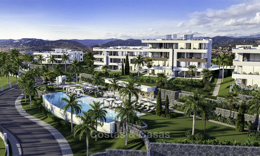 New deluxe contemporary townhouses for sale, front line golf, with stunning sea and golf views, East Marbella 16723