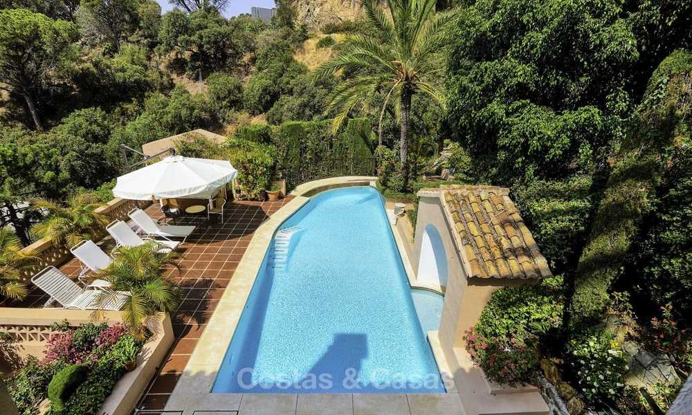 Cosy traditional-style villa with sea and mountain views for sale in El Madroñal, Benahavis - Marbella 16042