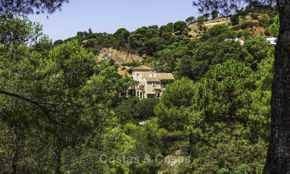 Cosy traditional-style villa with sea and mountain views for sale in El Madroñal, Benahavis - Marbella 16077