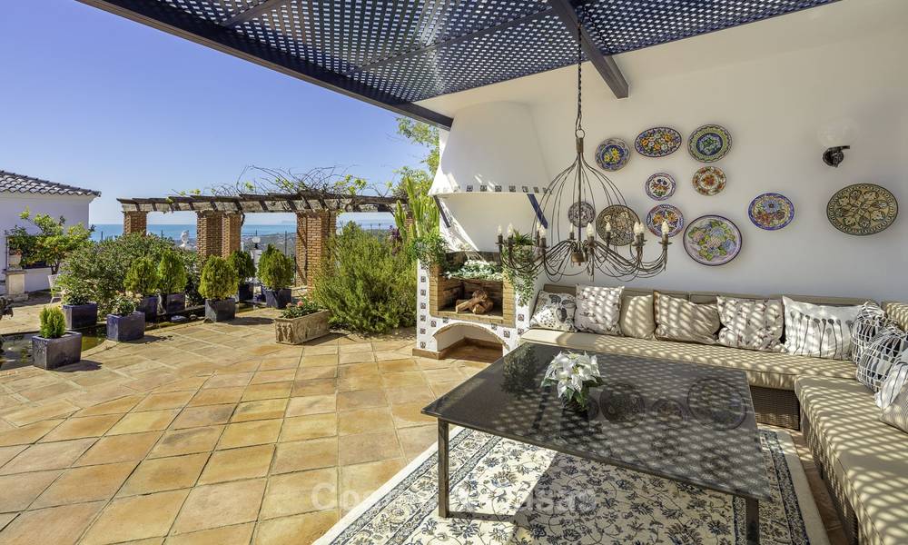 Huge Andalusian style villa with guest quarters, tennis court and unparalleled sea views for sale in El Madroñal, Benahavis - Marbella 15987