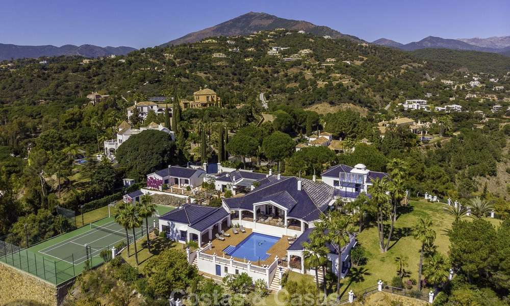 Huge Andalusian style villa with guest quarters, tennis court and unparalleled sea views for sale in El Madroñal, Benahavis - Marbella 15988