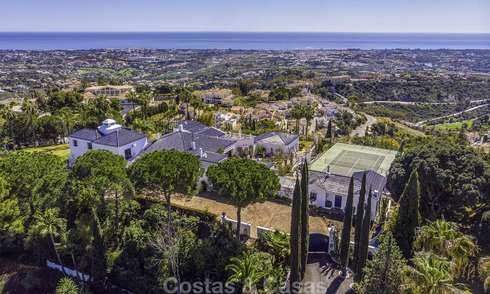Huge Andalusian style villa with guest quarters, tennis court and unparalleled sea views for sale in El Madroñal, Benahavis - Marbella 15989
