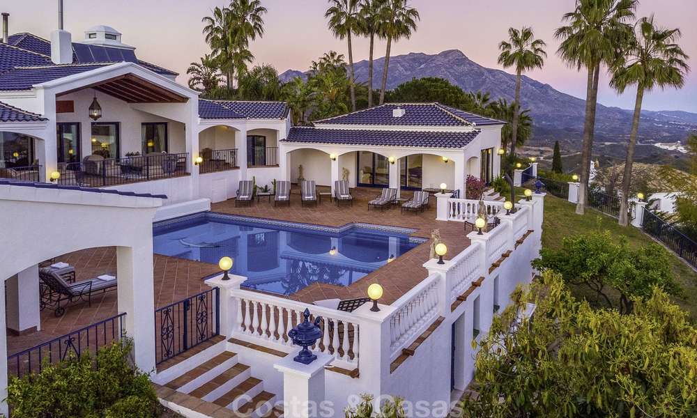 Huge Andalusian style villa with guest quarters, tennis court and unparalleled sea views for sale in El Madroñal, Benahavis - Marbella 15994