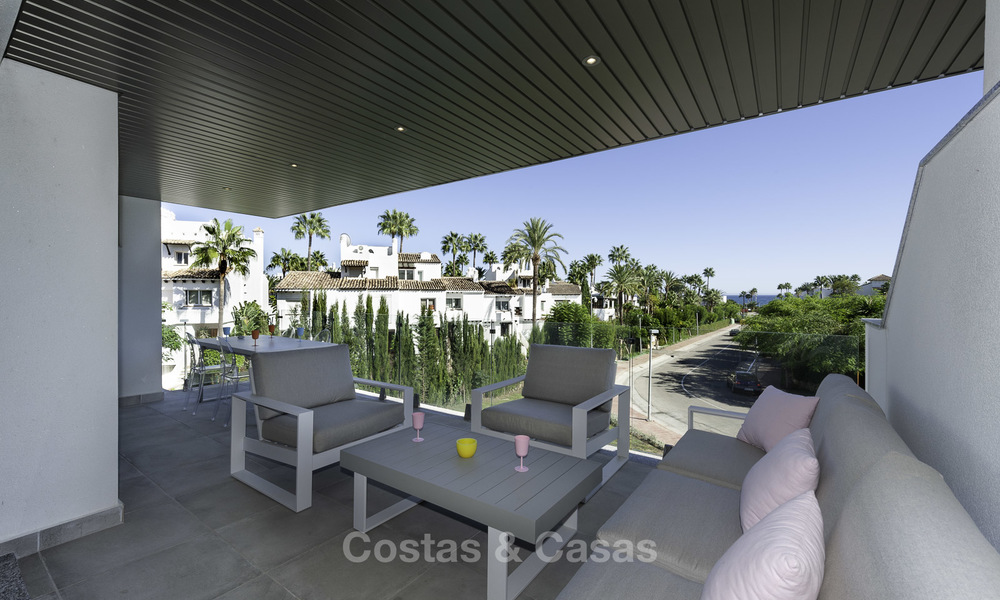 New contemporary beach side apartment with sea views for sale, short stroll to the beach, between Marbella and Estepona 16913