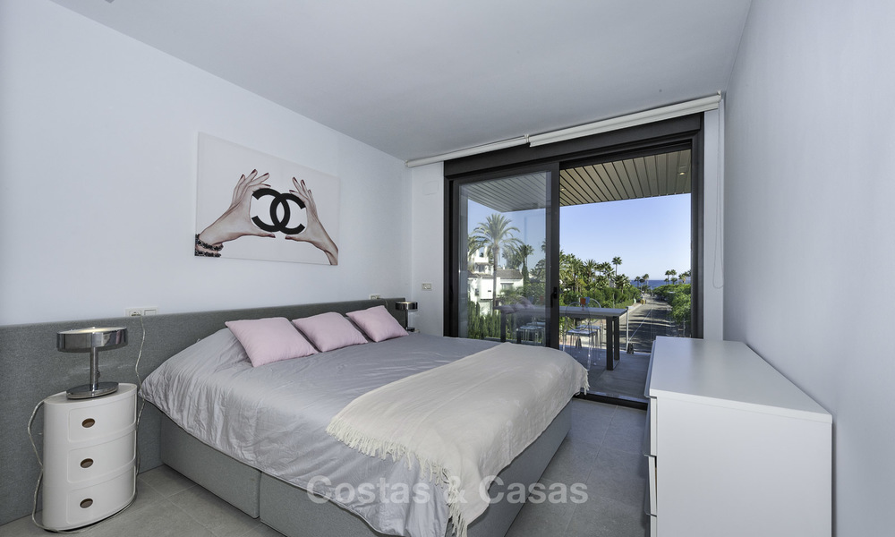 New contemporary beach side apartment with sea views for sale, short stroll to the beach, between Marbella and Estepona 16919