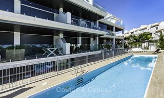 New contemporary beach side apartment with sea views for sale, short stroll to the beach, between Marbella and Estepona 16923 