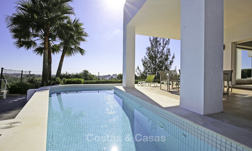 Contemporary villa, with magnificent sea views for sale, frontline golf position in Benahavis - Marbella 17287