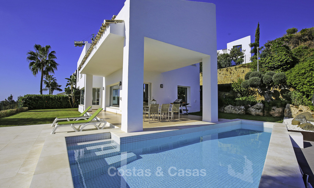 Contemporary villa, with magnificent sea views for sale, frontline golf position in Benahavis - Marbella 17290