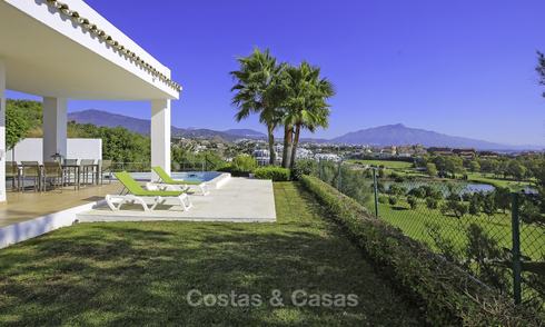Contemporary villa, with magnificent sea views for sale, frontline golf position in Benahavis - Marbella 17297