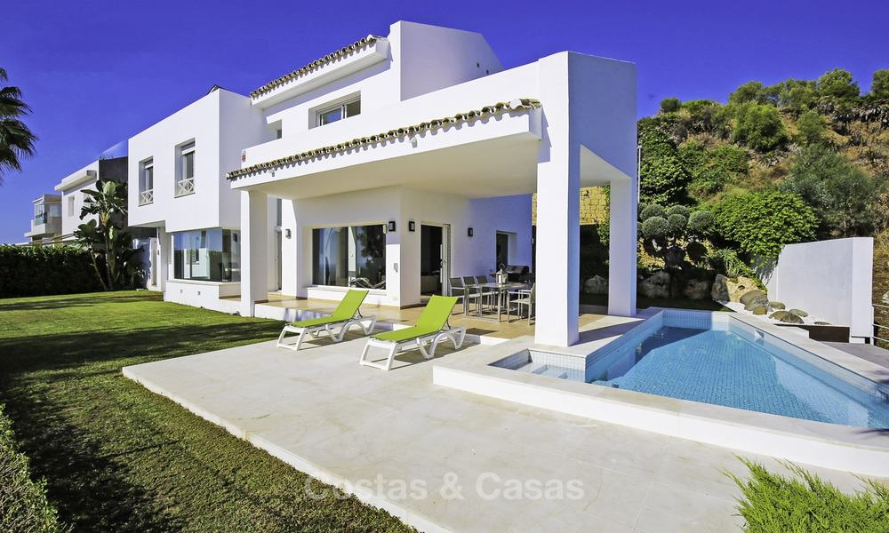 Contemporary villa, with magnificent sea views for sale, frontline golf position in Benahavis - Marbella 17298