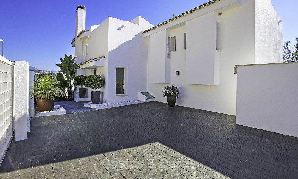 Contemporary villa, with magnificent sea views for sale, frontline golf position in Benahavis - Marbella 17300