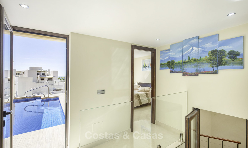 Modern penthouse apartment with private pool for sale in a frontline beach complex, New Golden Mile, Estepona 18645