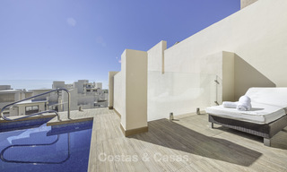 Modern penthouse apartment with private pool for sale in a frontline beach complex, New Golden Mile, Estepona 18648 