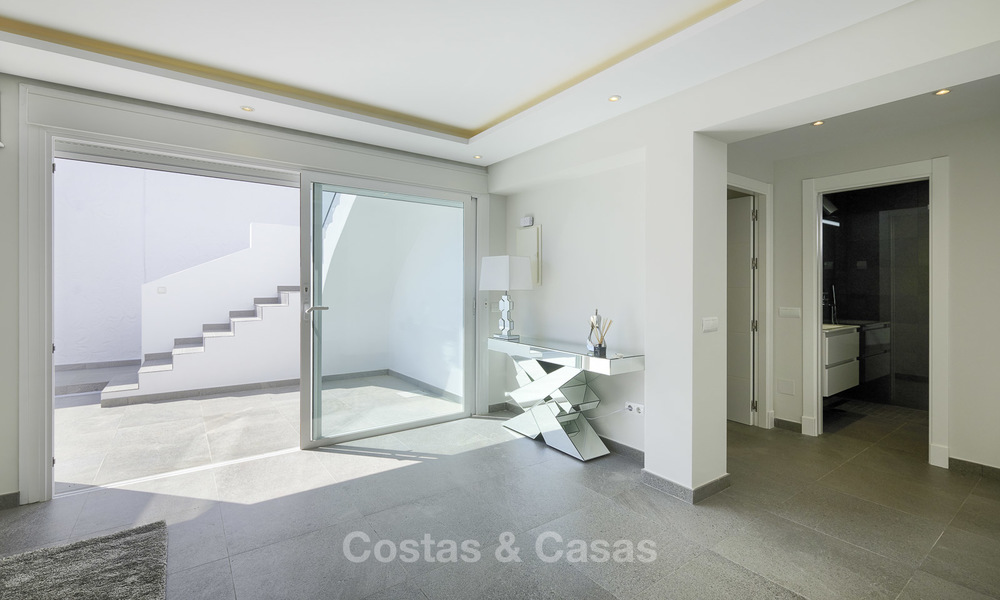 Two cosy, fully renovated townhouses for sale as one on the New Golden Mile, East Estepona 19362