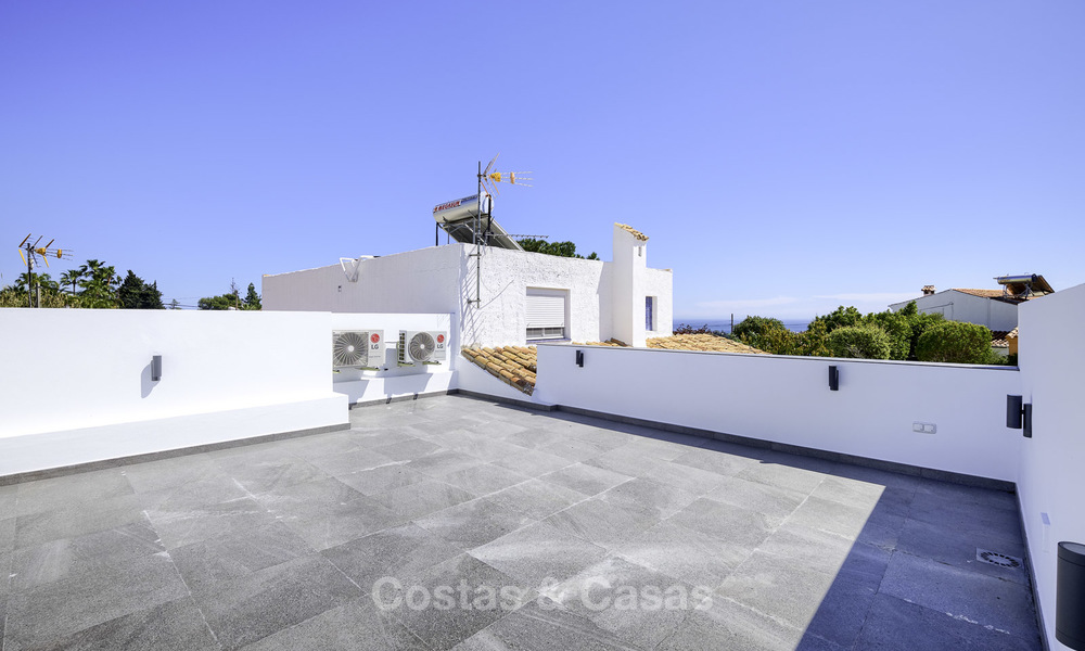 Two cosy, fully renovated townhouses for sale as one on the New Golden Mile, East Estepona 19364
