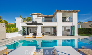 Delightful, completely renovated luxury villa with golf and sea views for sale in Nueva Andalucía, Marbella 19831 