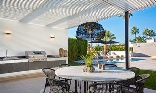 Delightful, completely renovated luxury villa with golf and sea views for sale in Nueva Andalucía, Marbella 19836 